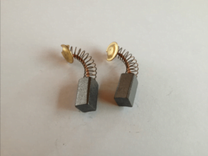 Why do brushed motors spark